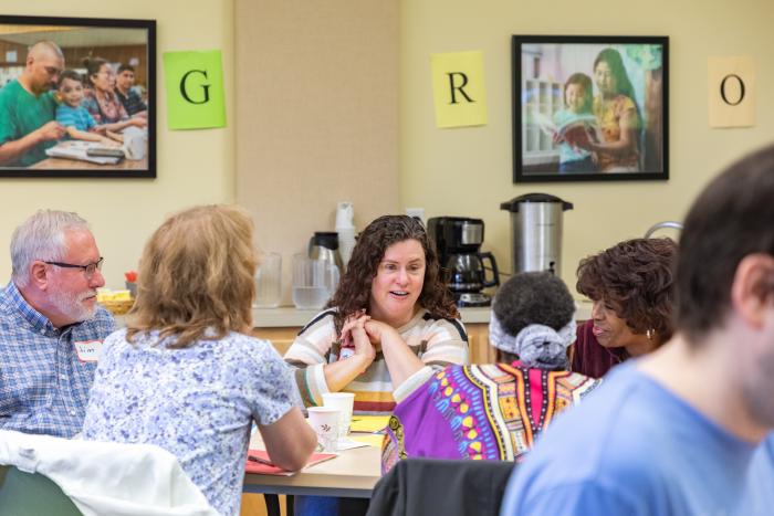 Educators gather in conference room